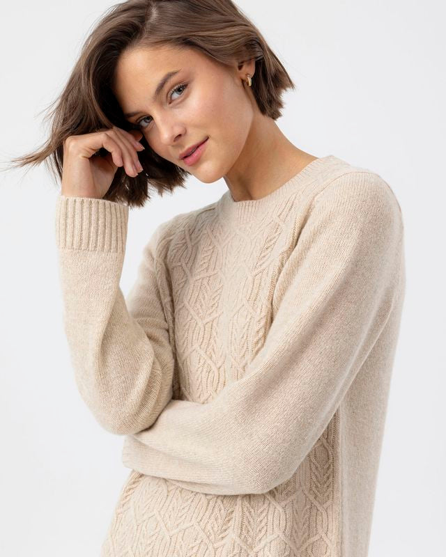 Antonia Dress
Knitted dress in wool Sand