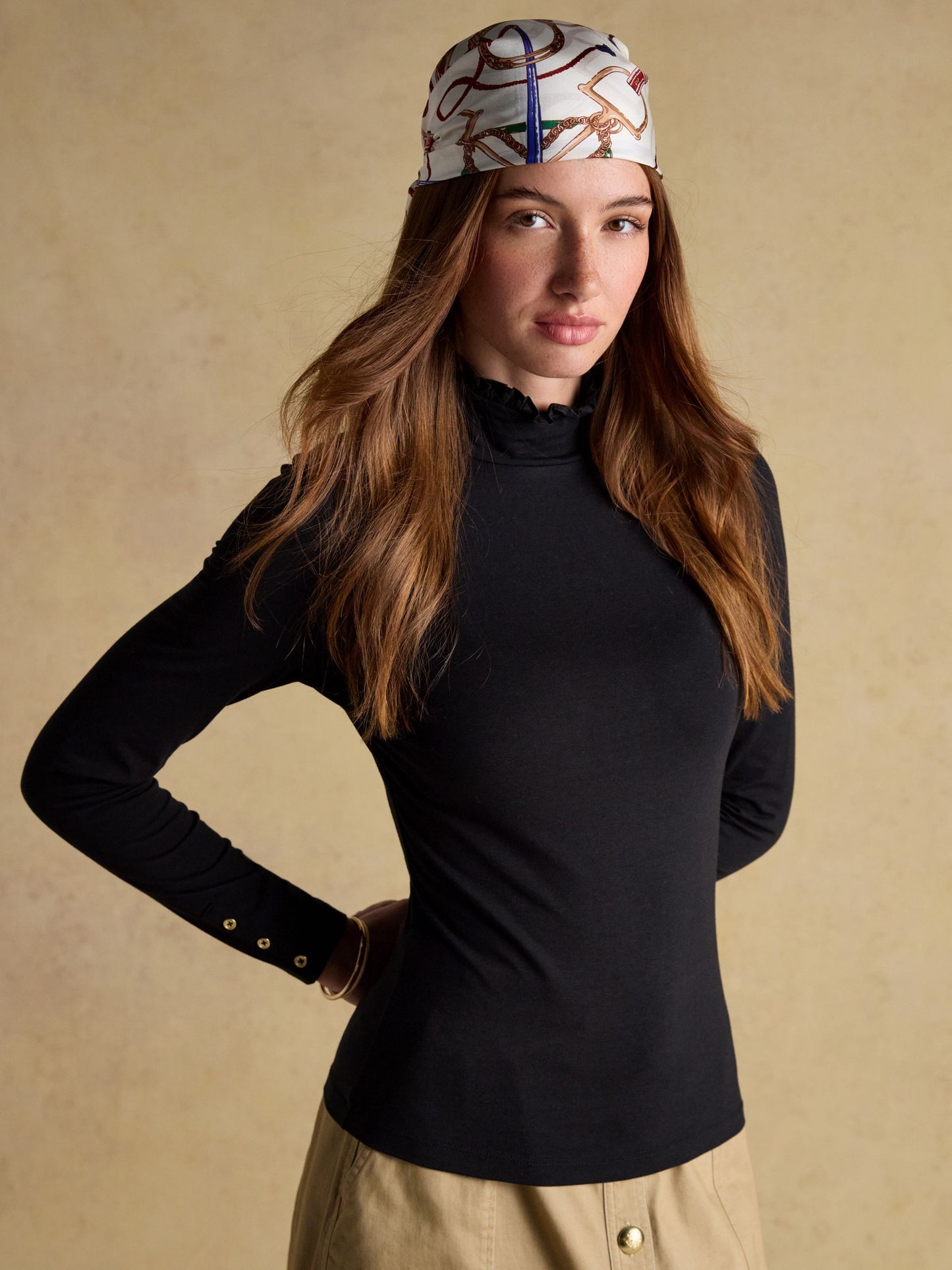 Amy Black Long Sleeve High Frill Neck Jersey Top