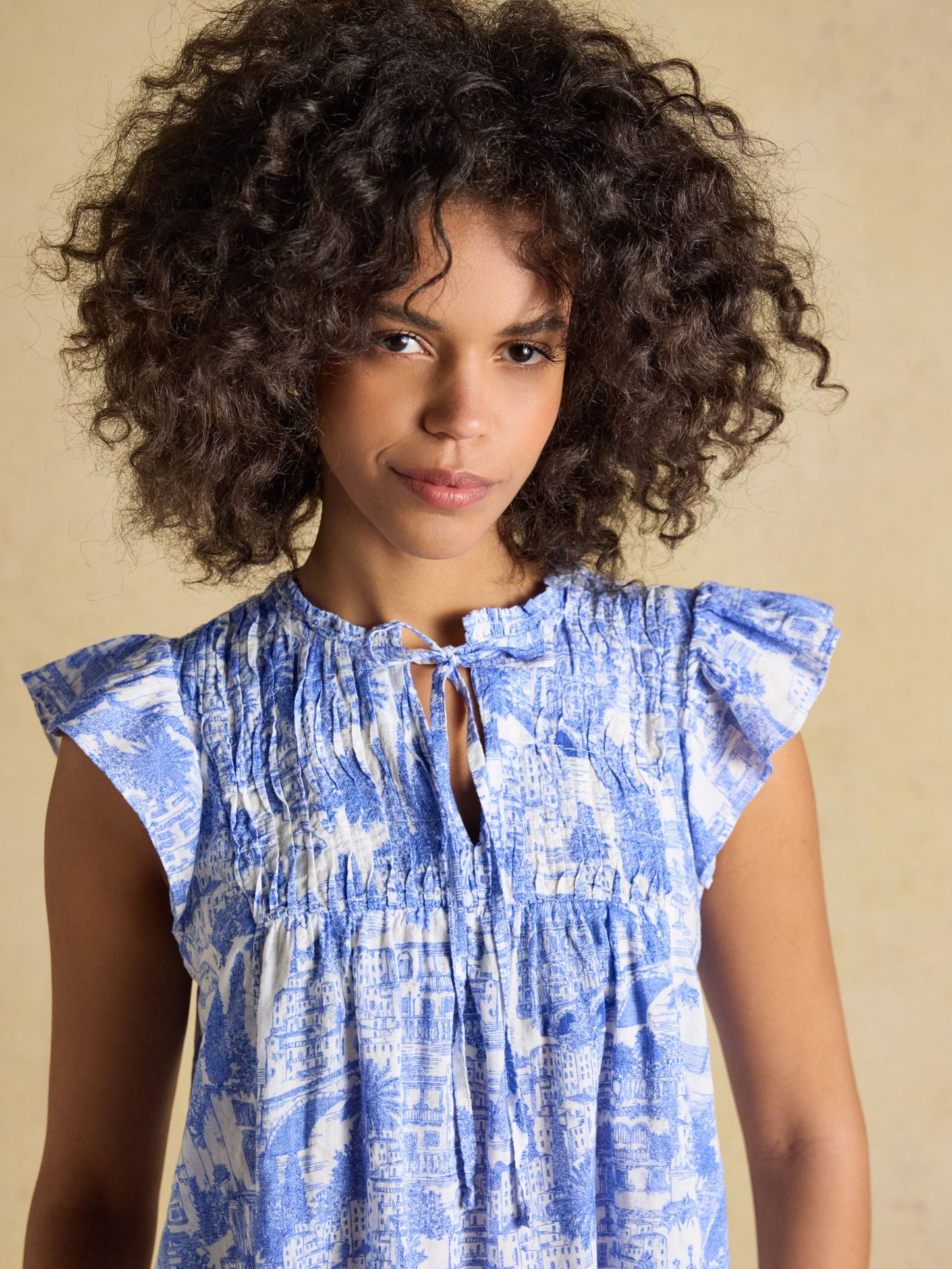 Nolan Blue Toile Sleeveless Tie Neck Blouse