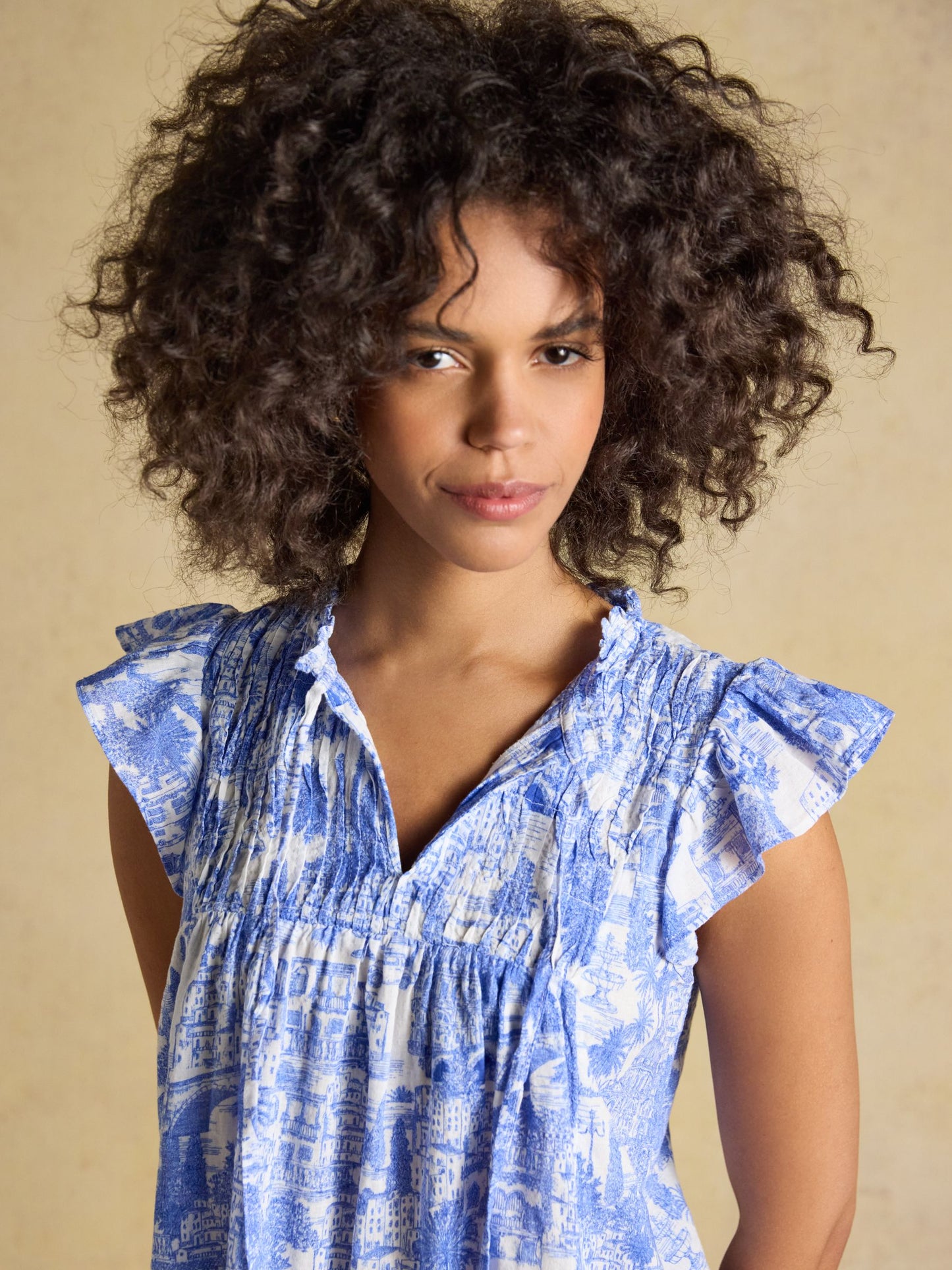Nolan Blue Toile Sleeveless Tie Neck Blouse