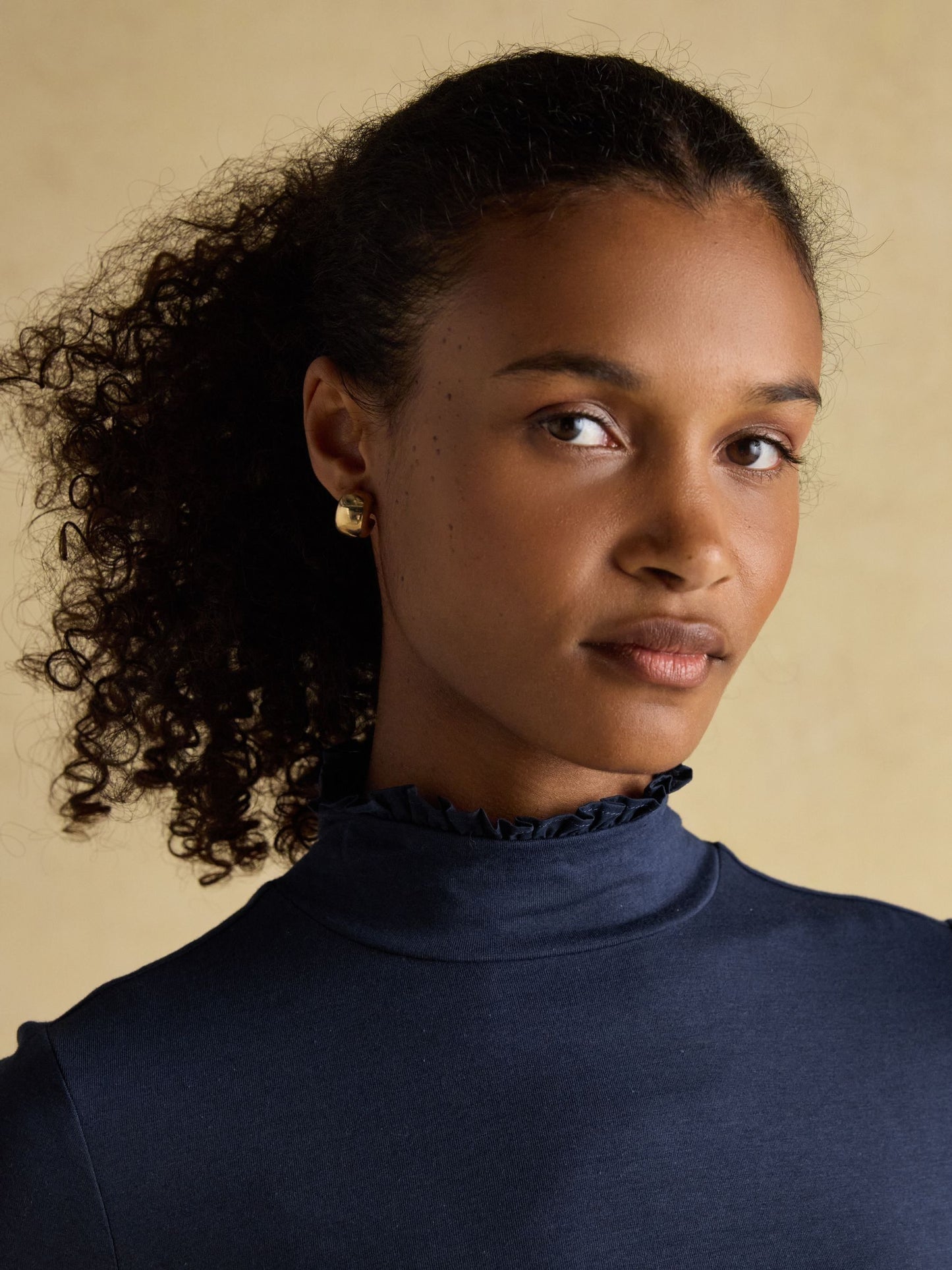 Amy Navy Long Sleeve High Frill Neck Jersey Top